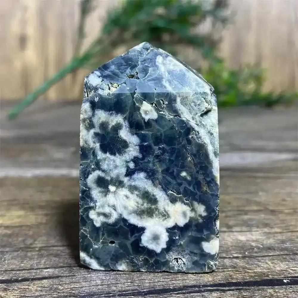 Polished Green Ocean Jasper tower featuring calming green tones and creamy orb patterns for Heart Chakra healing.