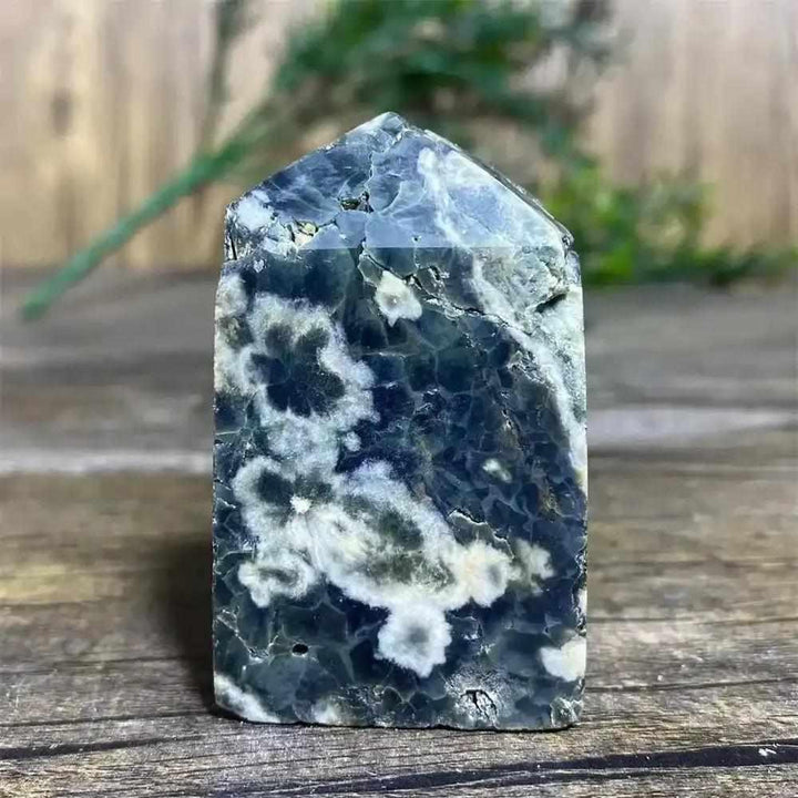 Polished Green Ocean Jasper tower featuring calming green tones and creamy orb patterns for Heart Chakra healing.
