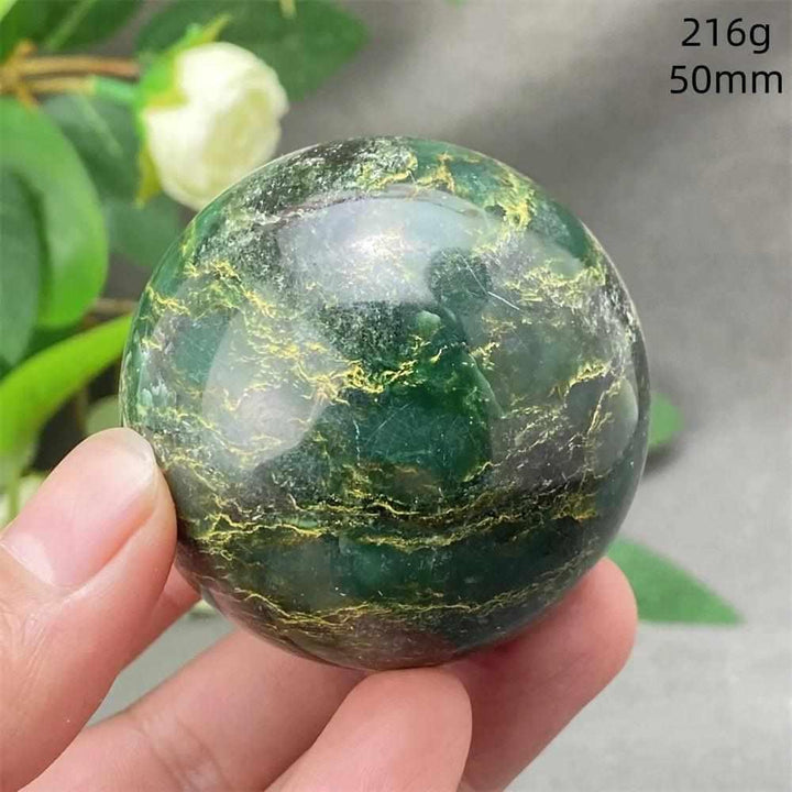 Polished 50mm Green Verdite sphere with deep green tones and golden veins for grounding and heart chakra healing.