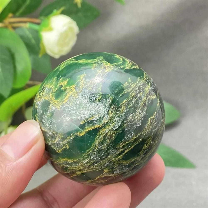 Polished Green Verdite sphere featuring deep green tones and natural veining, perfect for heart chakra grounding.