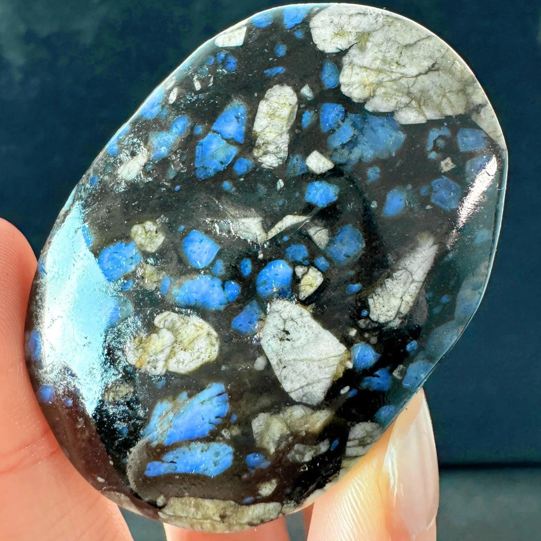 Polished Quesera Palm-Crystal with vibrant blue spots, ideal for healing and energy work.