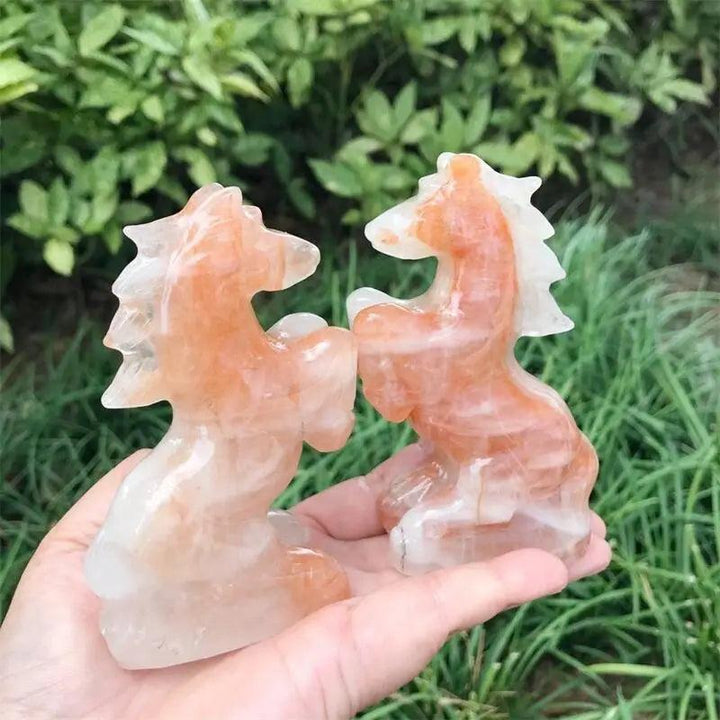Hand-carved Hematoid Fire Quartz horse sculpture with vibrant red and orange hematite flames for grounding energy.