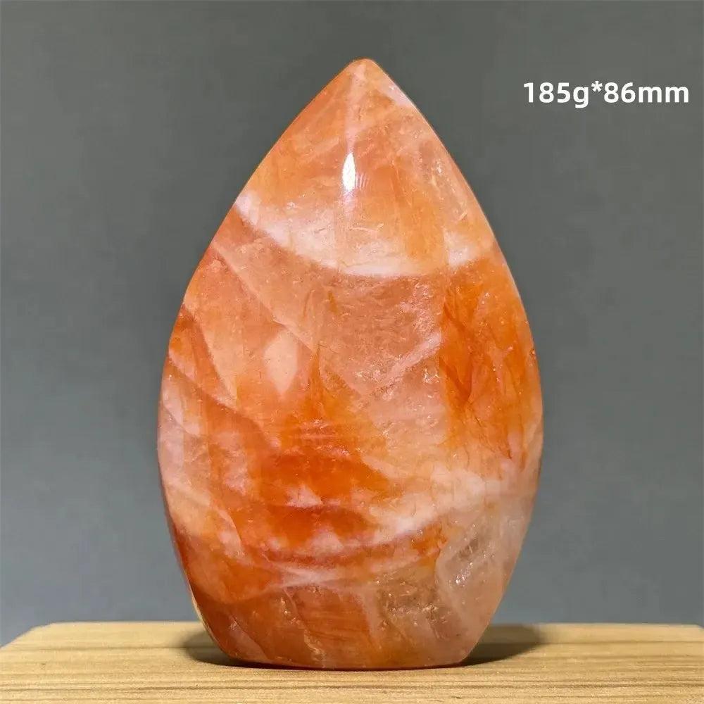 Hematoid Fire Quartz freeform torch from Crystal Destiny, showcasing fiery red, orange, and gold hues.