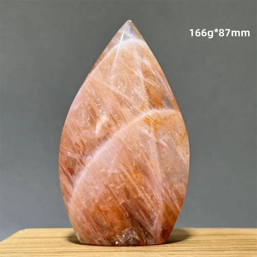 Hematoid Fire Quartz freeform torch from Crystal Destiny, showcasing fiery red, orange, and gold inclusions.