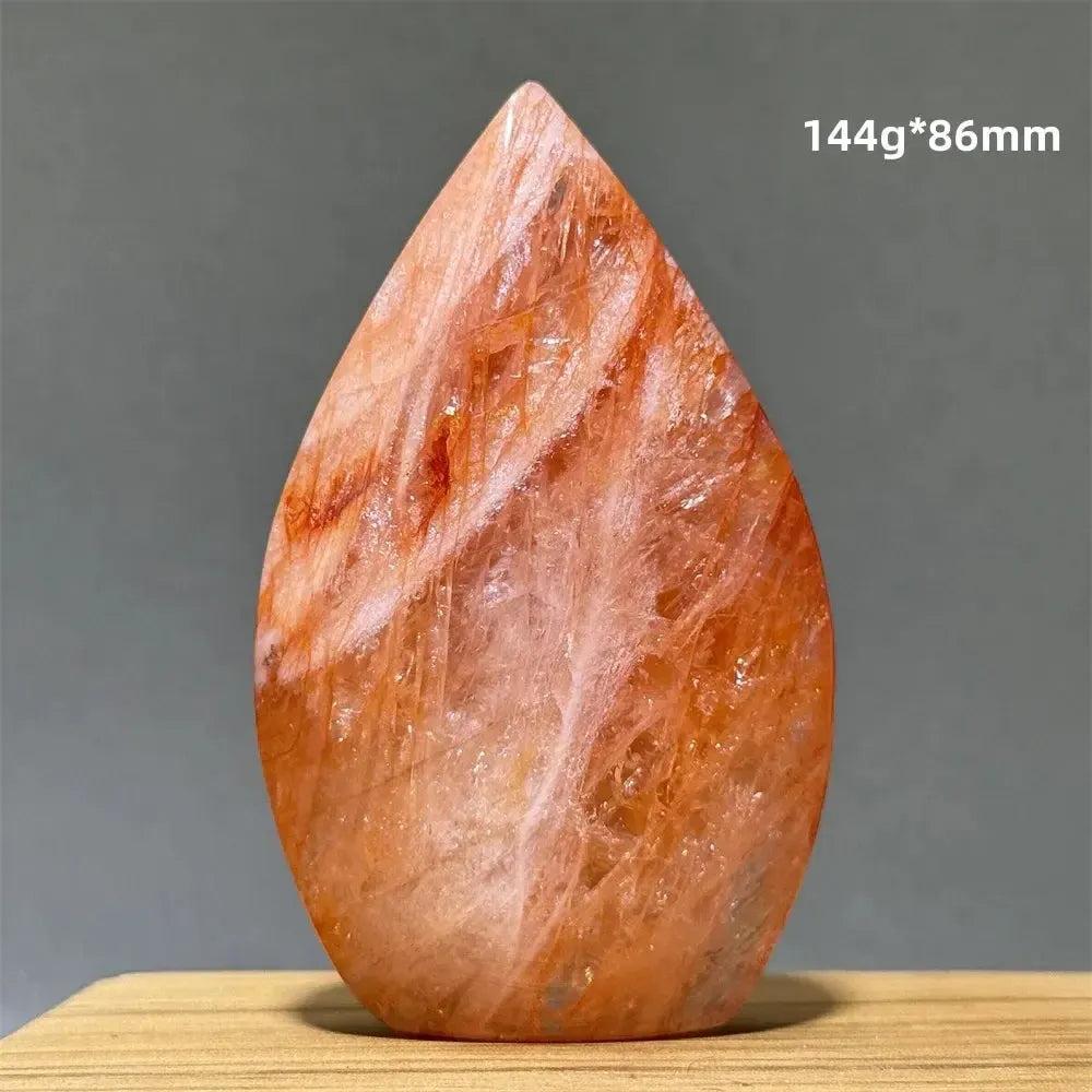 Hematoid Fire Quartz freeform torch from Crystal Destiny, showcasing vibrant red, orange, and gold mineral inclusions.