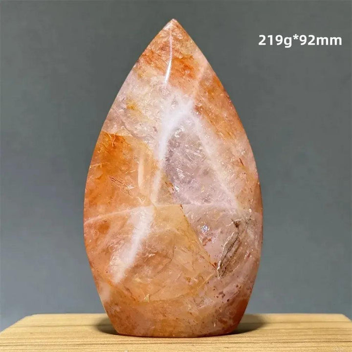 Crystal Destiny's Hematoid Fire Quartz freeform torch, displaying fiery red, orange, and gold mineral inclusions.