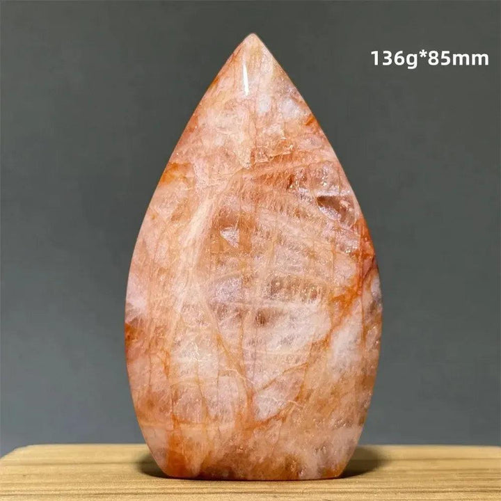 Hematoid Fire Quartz freeform torch from Crystal Destiny, showcasing vibrant red, orange, and gold mineral inclusions.