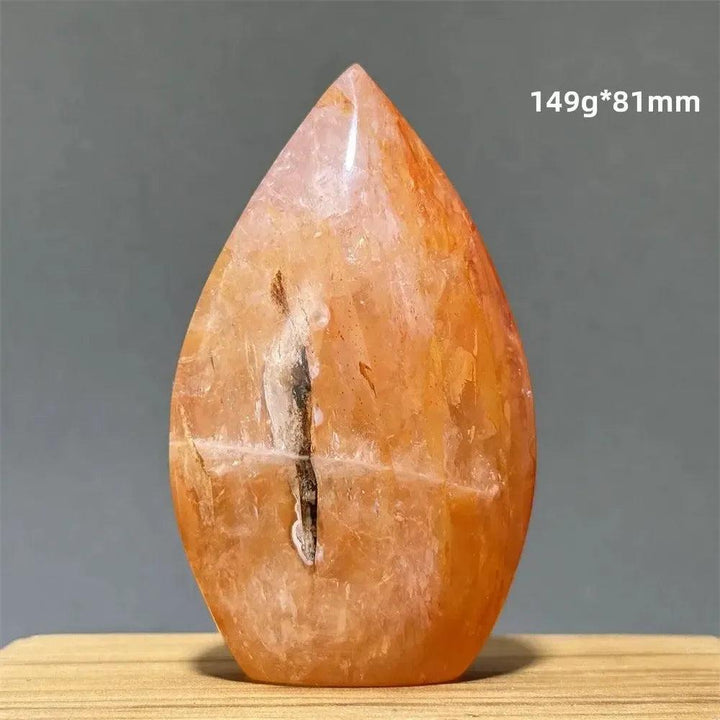 Hematoid Fire Quartz freeform torch from Crystal Destiny, showcasing fiery red, orange, and gold hues.