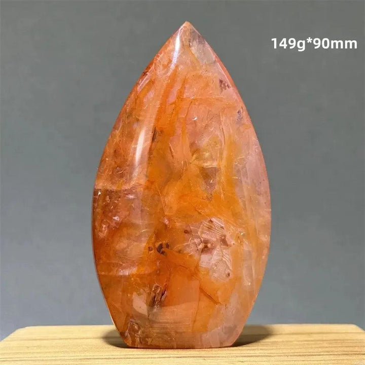 Hematoid Fire Quartz freeform torch from Crystal Destiny, showcasing fiery red, orange, and gold inclusions.