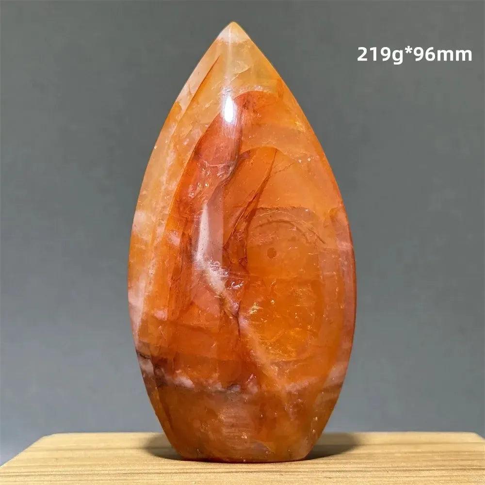 Hematoid Fire Quartz freeform torch from Crystal Destiny, showcasing fiery red, orange, and gold inclusions.