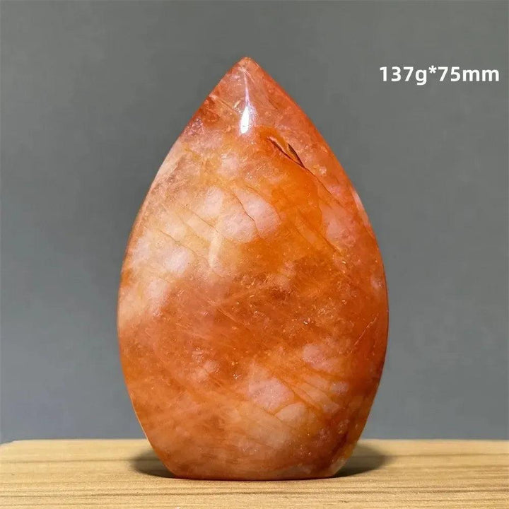Crystal Destiny's Hematoid Fire Quartz freeform torch, a vibrant red-orange natural mineral specimen.