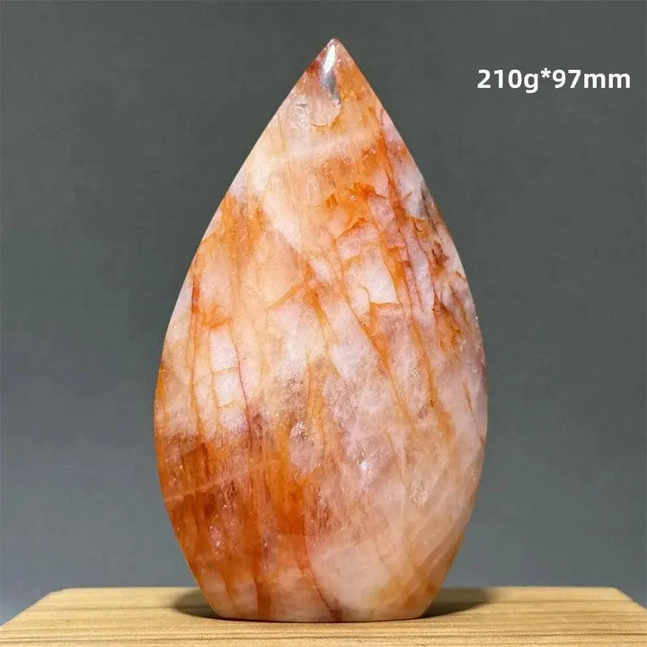 Hematoid Fire Quartz freeform torch from Crystal Destiny, showcasing fiery red and orange inclusions.