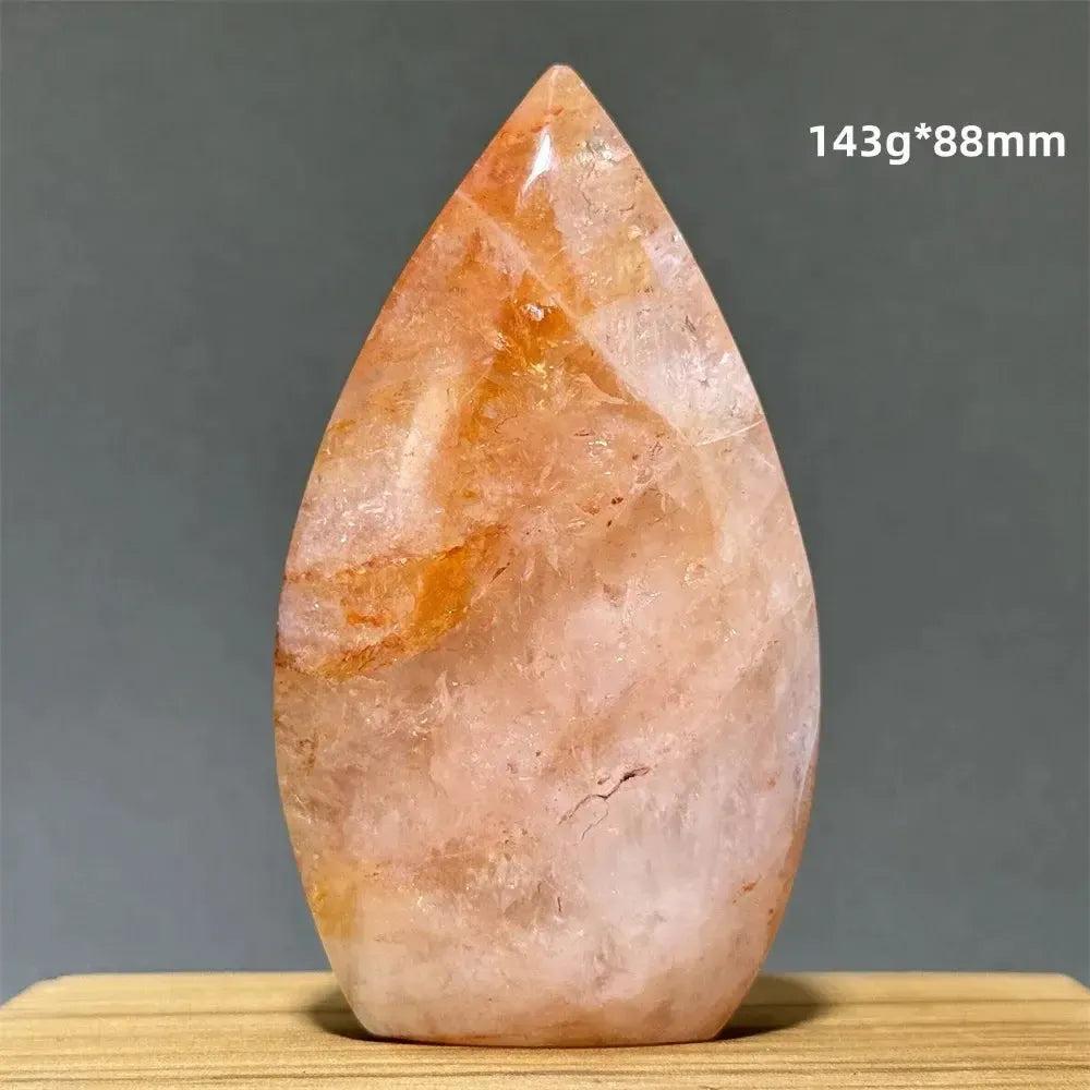 Hematoid Fire Quartz freeform torch from Crystal Destiny, showcasing fiery red, orange, and gold inclusions.