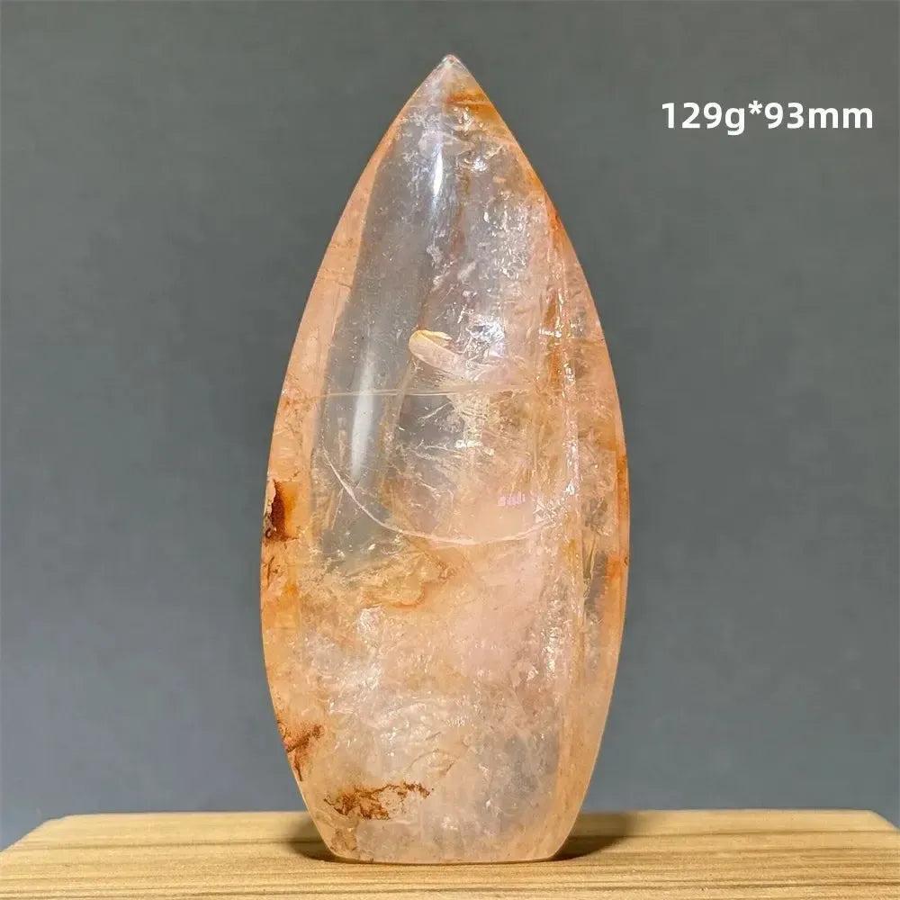 Hematoid Fire Quartz freeform torch from Crystal Destiny, featuring clear quartz with red and orange inclusions.