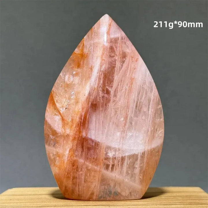 Hematoid Fire Quartz freeform torch from Crystal Destiny, displaying fiery red and orange inclusions.