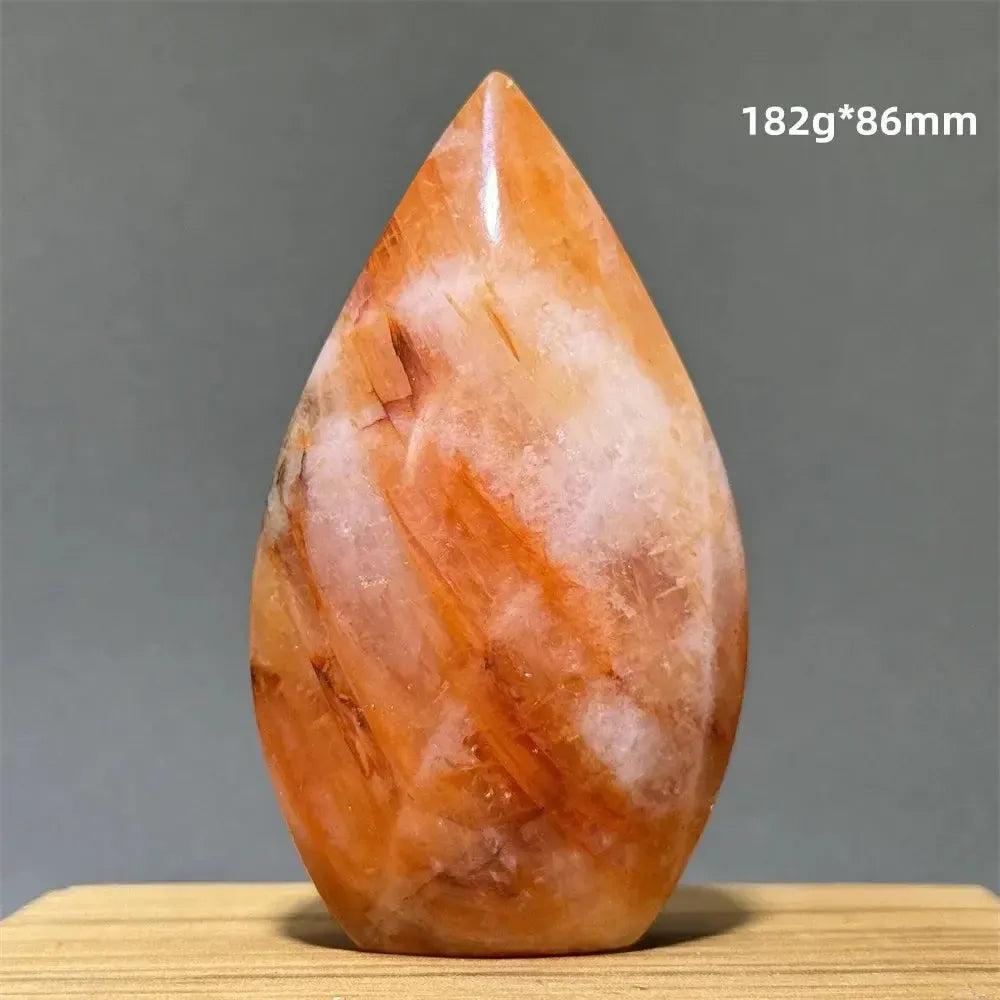 Hematoid Fire Quartz freeform torch from Crystal Destiny, showcasing fiery red, orange, and gold inclusions.