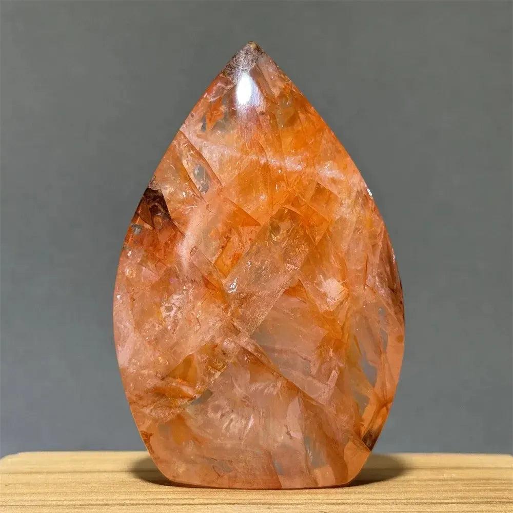 Vibrant orange and red Hematoid Fire Quartz freeform torch from Crystal Destiny, showcasing fiery inclusions.