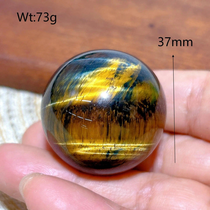 37mm Blue Tiger Eye crystal sphere with flashy golden chatoyancy, perfect for healing energy and home decor.