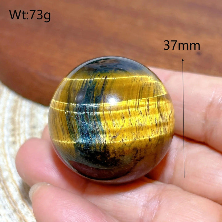 37mm blue and yellow Tiger Eye crystal sphere, a polished healing stone ball for energy, decor, and unique gifts.
