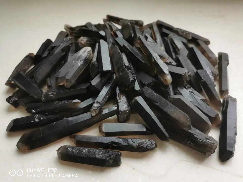 Himalayan Black Lemurian Smoky Quartz Crystal Points: Dark, grounding, natural Lemurian-style crystal points.