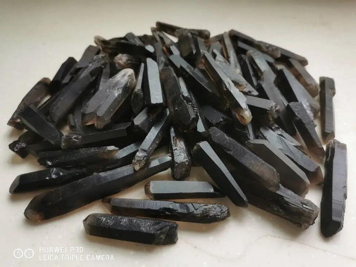 Himalayan Black Lemurian Smoky Quartz Crystal Points: Dark, grounding, natural Lemurian-style crystal points.