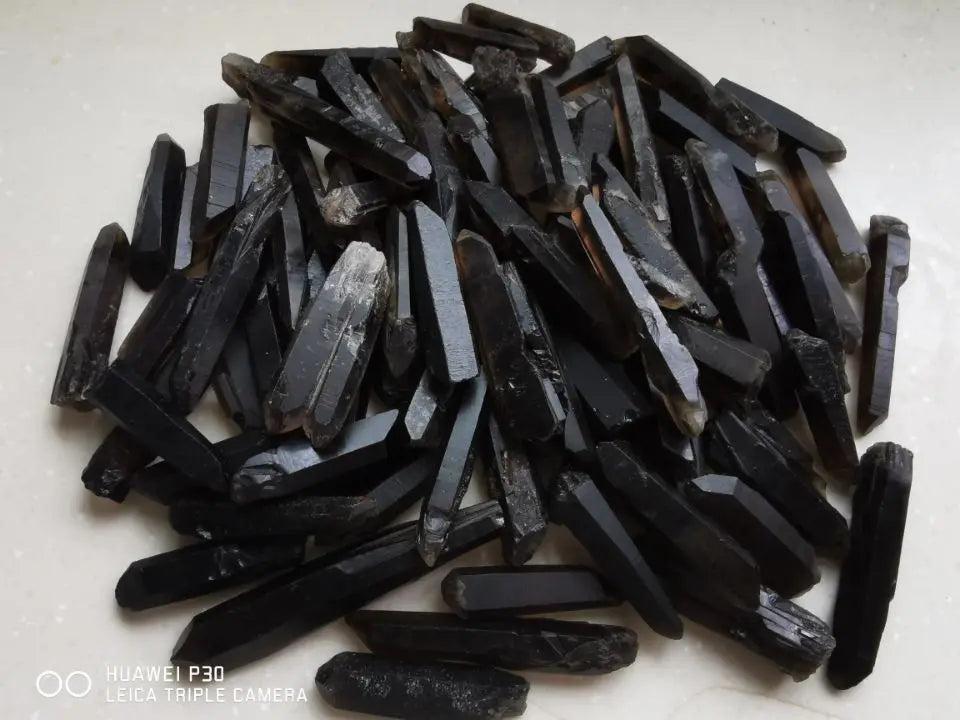 Himalayan Black Lemurian Smoky Quartz Crystal Points: Dark, grounding, natural Lemurian-style crystal points.
