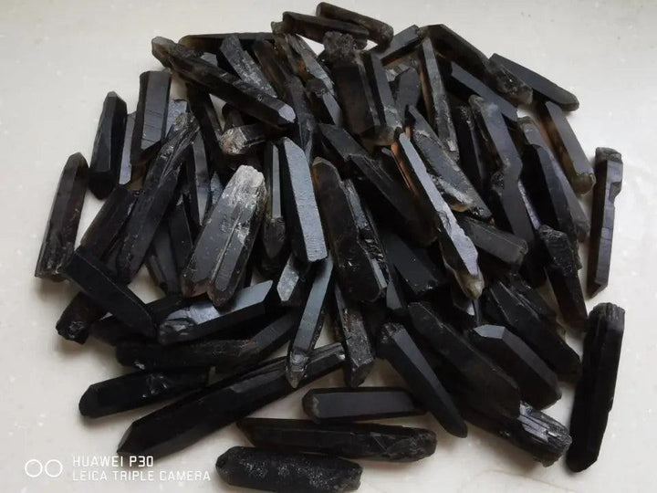 Himalayan Black Lemurian Smoky Quartz Crystal Points: Dark, grounding, natural Lemurian-style crystal points.