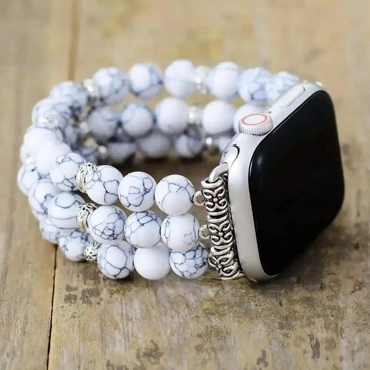 Howlite Beaded Apple Watch Band with white and gray marbled stones, promoting calm and style.