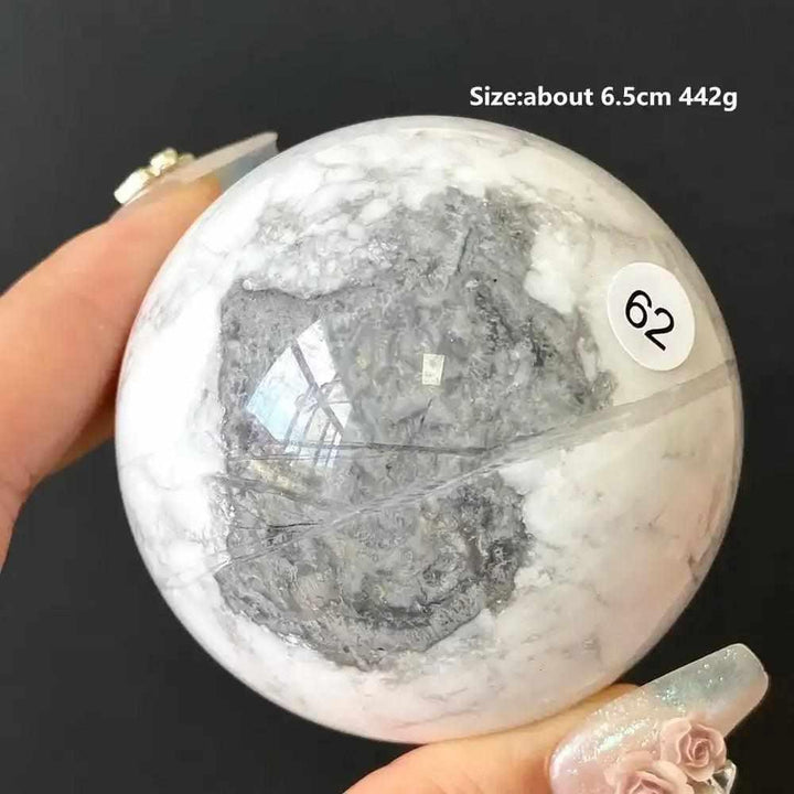 Polished 6.5cm Howlite sphere #62 featuring creamy white stone with bold gray inclusions for calming Crown Chakra energy.