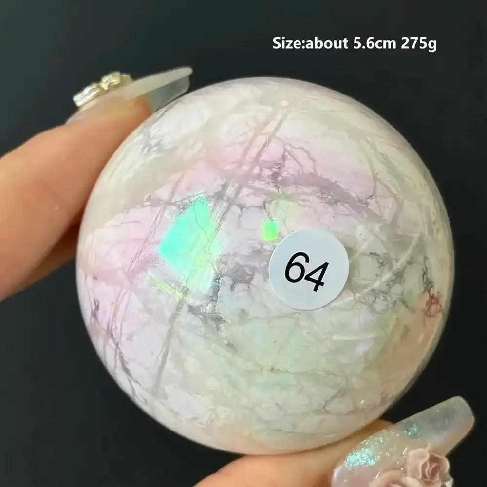 Polished 5.6cm Howlite sphere #64 featuring creamy white stone with delicate gray veining and calming iridescent flashes.