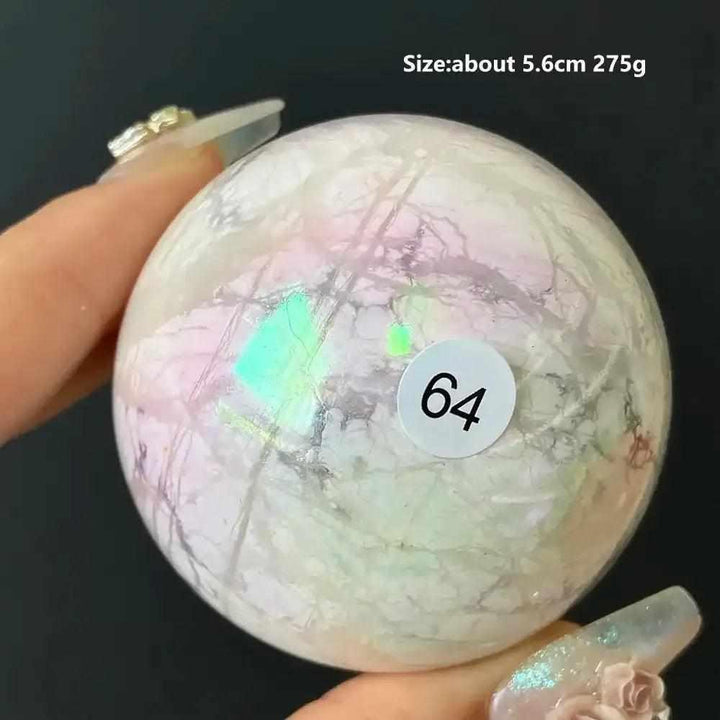 Polished 5.6cm Howlite sphere #64 featuring creamy white stone with delicate gray veining and calming iridescent flashes.