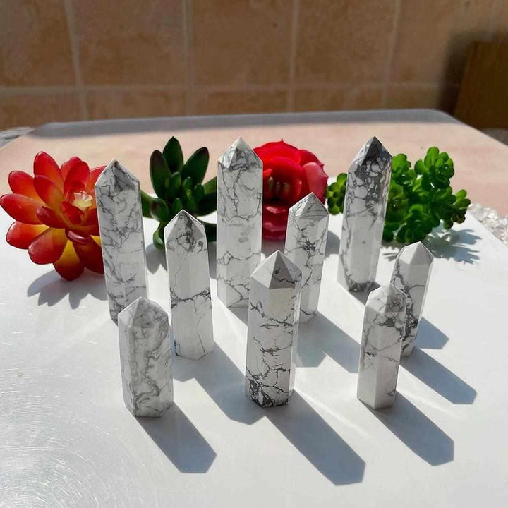 Polished Howlite tower points with white stone and gray veining, perfect for calm, meditation, and crown chakra healing.