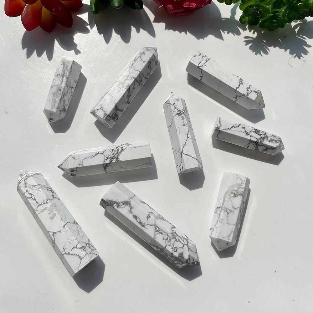 Polished Howlite tower points featuring white stone with unique gray veining for calm, crown chakra meditation.