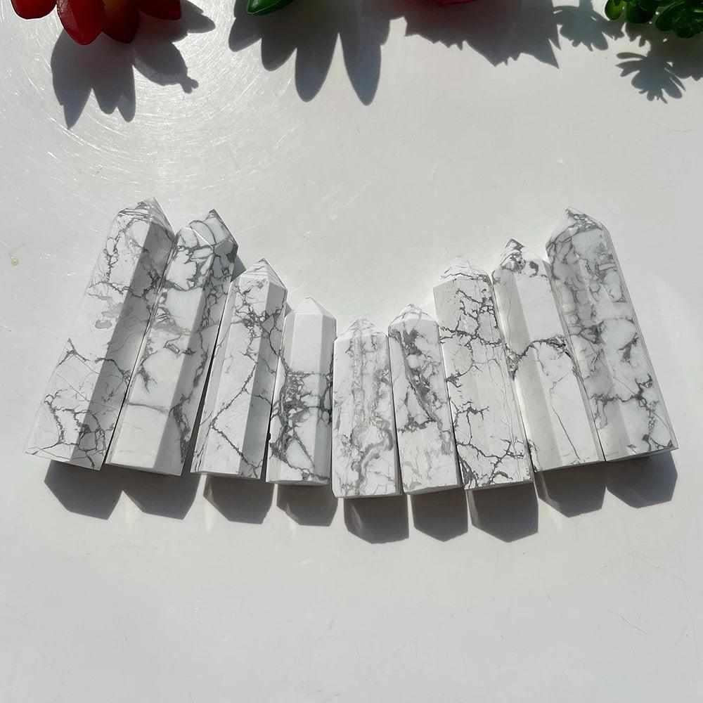 Polished white Howlite tower points featuring unique gray veining for calm, crown chakra meditation and home decor.
