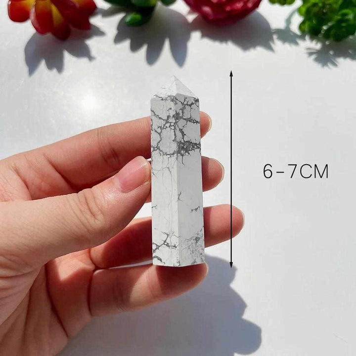 Polished Howlite Tower Point with white stone and gray veining, perfect for calm, meditation, and crown chakra healing.