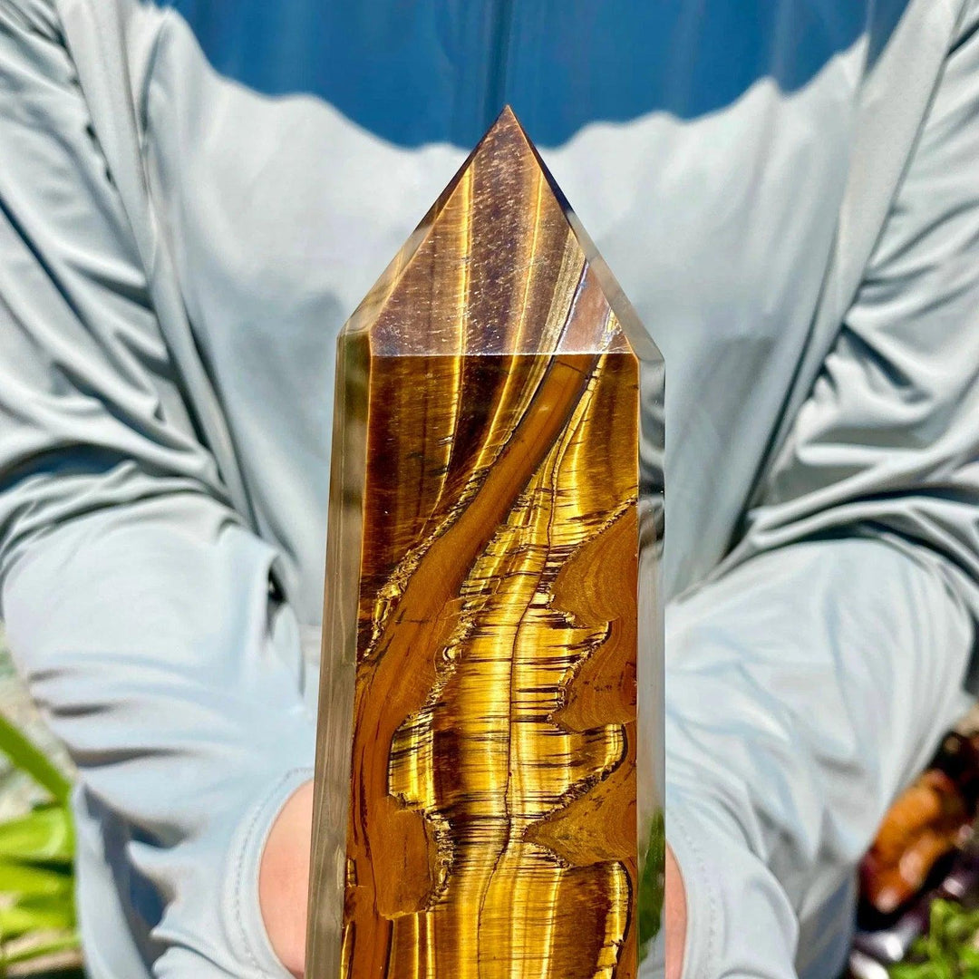 Polished Yellow Tiger's Eye obelisk crystal wand featuring stunning golden-brown chatoyant bands for healing energy.
