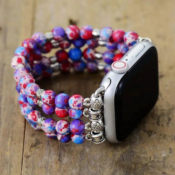 Crystal Destiny Imperial Jasper Apple iWatch band with vibrant purple, red, and blue beads, silver accents.