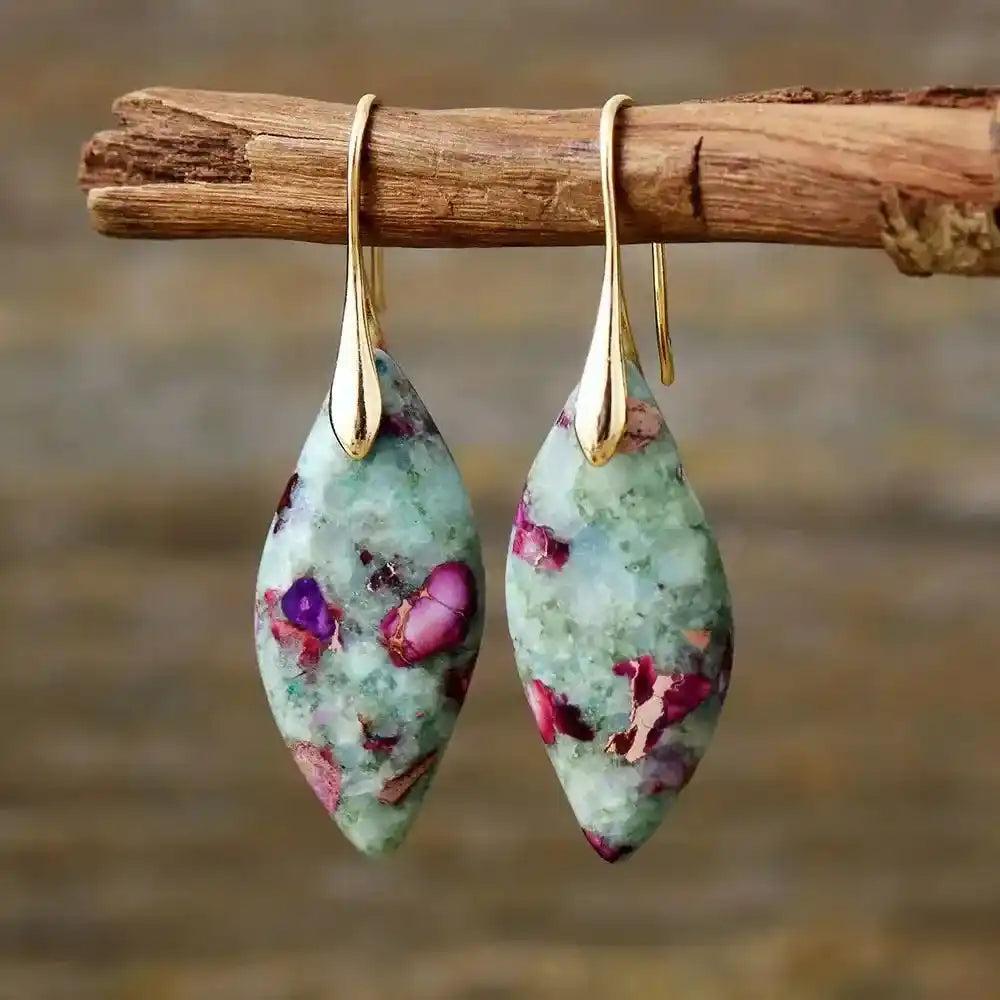 Boho Imperial Jasper huggie earrings from Crystal Destiny, featuring unique green and purple stones with gold hooks.