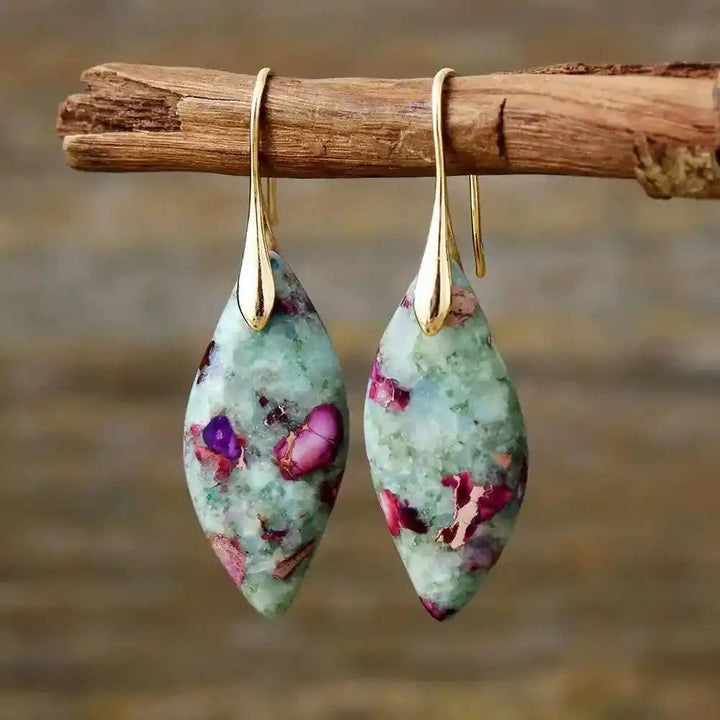 Boho Imperial Jasper huggie earrings from Crystal Destiny, featuring unique green and purple stones with gold hooks.