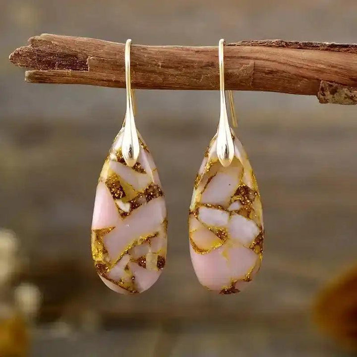 Crystal Destiny Imperial Jasper Boho Huggie Earrings: pink, white, and gold teardrop stones on gold-plated hooks.