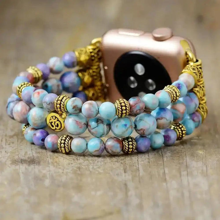 Imperial Jasper Beaded Strap Apple Watch Band with calming blue, purple, and earthy tones, gold accents, and Om charm.