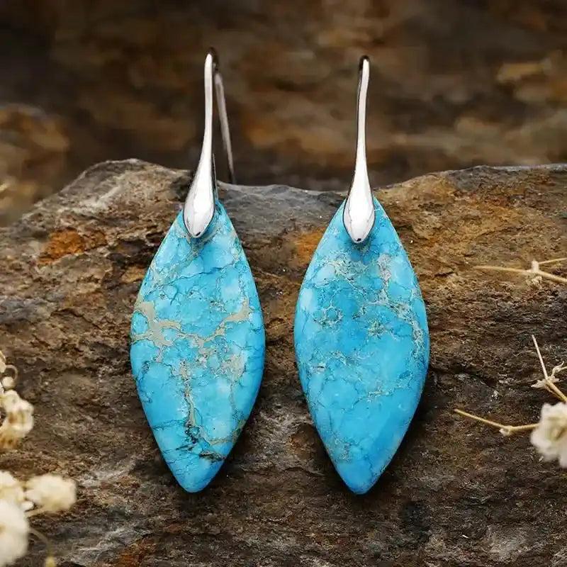 Vivid turquoise Imperial Jasper marquise-cut drop earrings with silver hooks, offering grounding and emotional balance.