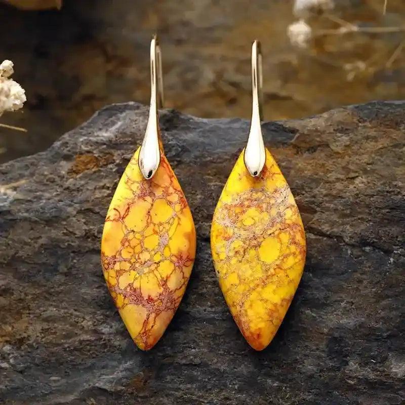 Imperial Jasper Crystal Drop Earrings: Marquise-cut yellow jasper with red veins and gold hooks, offering grounding energy.