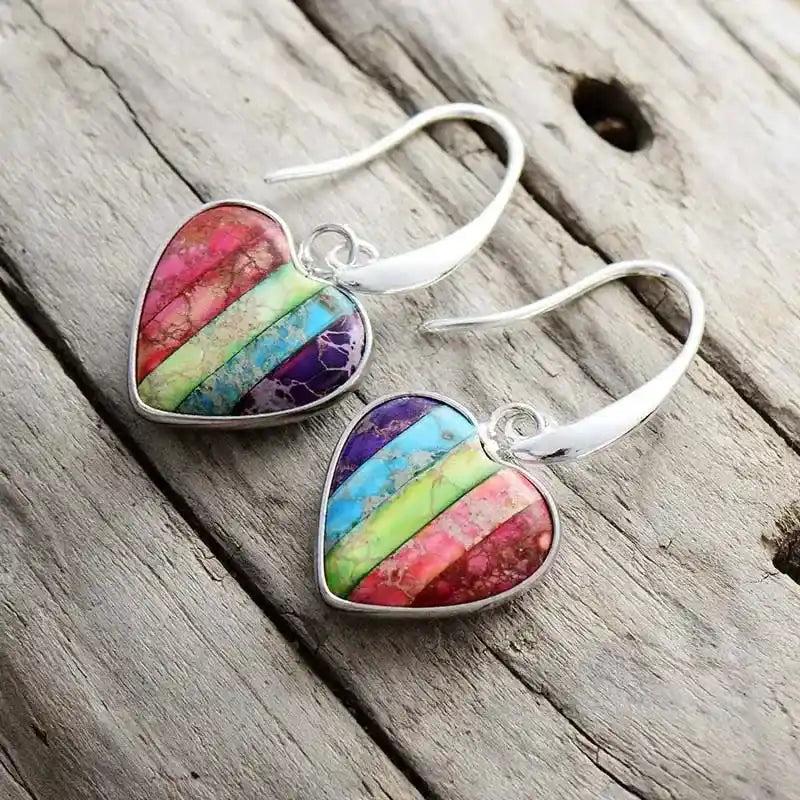 Heart-Shaped 7 Chakra Drop Earrings with vibrant healing stones and silver-plated design for balance and style.
