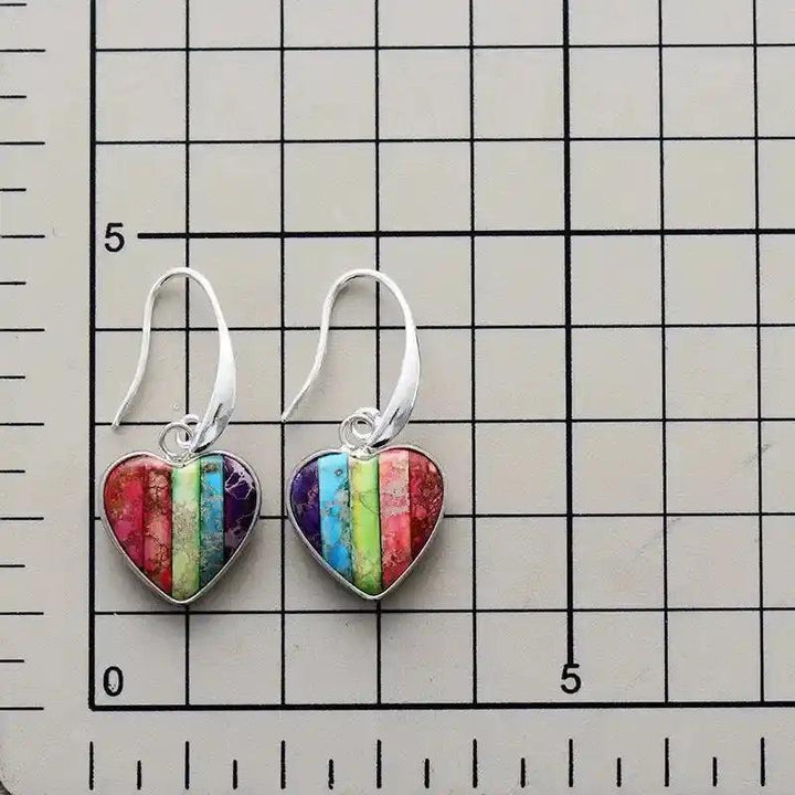 Heart-Shaped 7 Chakra Drop Earrings with vibrant healing stones in silver-plated design for balance and spiritual well-being.