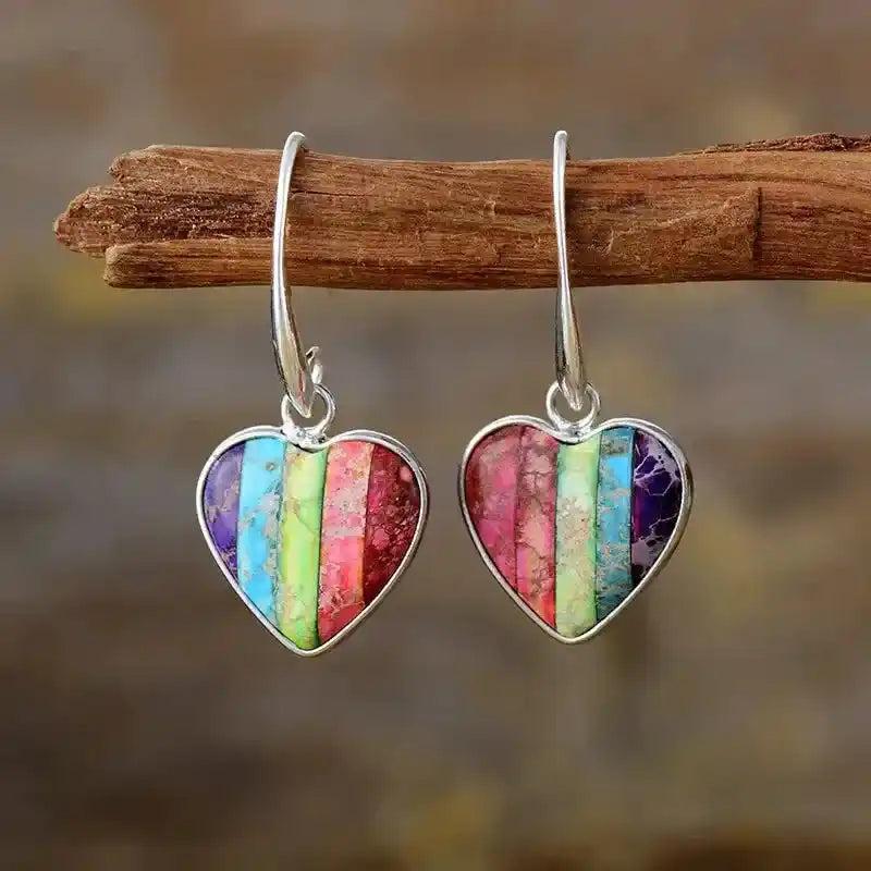 Heart-Shaped 7 Chakra Drop Earrings with vibrant healing stones in a silver-plated design for balance and spiritual well-being.