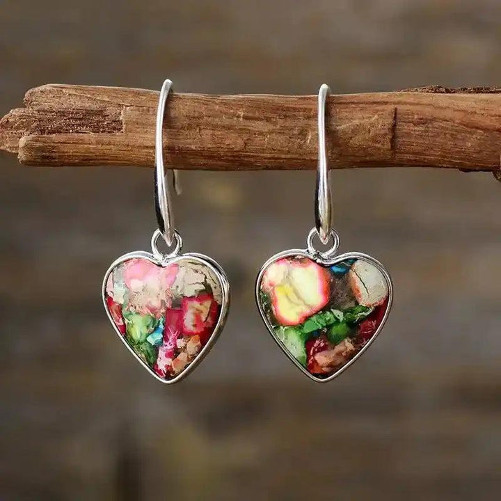 Heart-Shaped 7 Chakra Drop Earrings with vibrant healing stones in silver-plated design for balance and style.