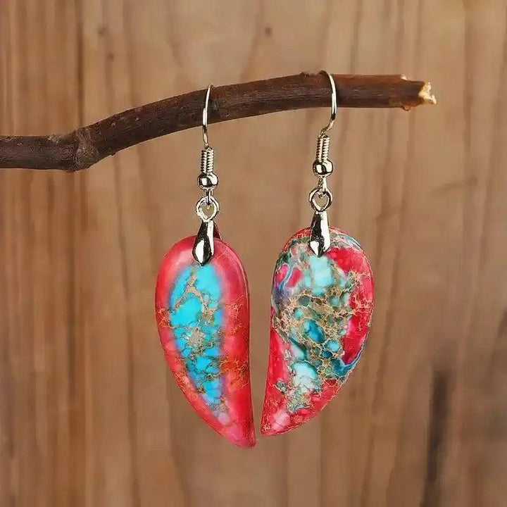 Vibrant Imperial Jasper Leaf Earrings with grounding red and turquoise stones, offering bohemian charm and emotional balance.