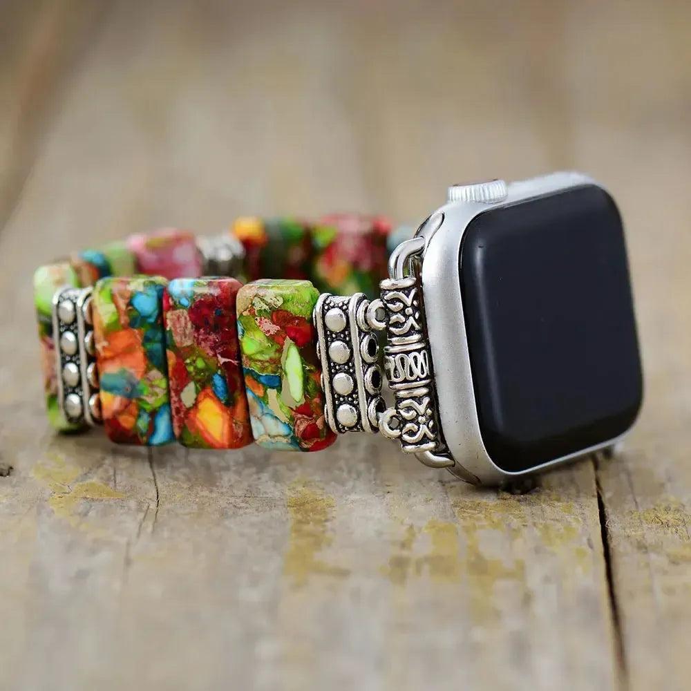 Vibrant 7 Chakra Imperial Jasper Apple iWatch Band with nurturing, colorful stones and silver connectors for balance.
