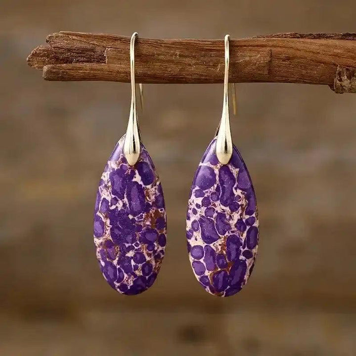 Crystal Destiny Imperial Jasper teardrop earrings: purple, white, and brown patterned stones with gold-tone hooks.